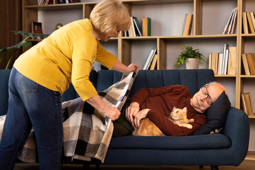 elderly-people-with-cat-pet_23-2150285605